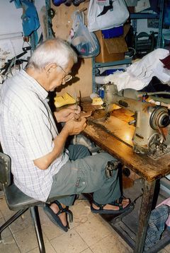 Israel, Dizengoff street, in the shoe manufacturing studio, 1995, גלית ששון וידמן, [object Object], [object Object], [object Object], [object Object], [object Object], Dokuforte #1098