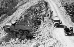Egypt, Mount Ataka, A truck stuck on the new road to Jebel Ataqa that was opened by the Engineering Corps.

With cooperation of Nadav Mann / Bitmuna, 1973, Dany Benshalom, Dany Benshalom, [object Object], [object Object], [object Object], [object Object], [object Object], [object Object], Dokuforte #3111