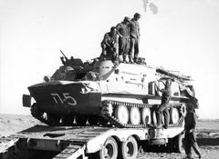 Israel, The Egyptian armored vehicle is being transferred by the 5th Brigade's reconnaissance unit, identified in the middle as Dany Benshalom.

With cooperation of Nadav Mann / Bitmuna, 1973, Dany Benshalom, Dany Benshalom, [object Object], [object Object], [object Object], [object Object], [object Object], [object Object], [object Object], [object Object], Dokuforte #3030