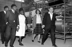 Israel, Rafi guiding a delegation from the Ministry of Health from Mali, Africa, at the factory. To his left is Chaya Ben-David, the laboratory manager at HaOgen.

With cooperation of Nadav Mann / Bitmuna, 1963, Dany Benshalom, Rafi Benshalom, [object Object], [object Object], [object Object], Dokuforte #3583