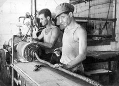 Israel, Next to the extruder for rubber pipes, on the right: Ehud Nahir, Yankele Maron (Yacov Miller)

With cooperation of Nadav Mann / Bitmuna, 1950, Dany Benshalom, Rafi Benshalom, [object Object], [object Object], [object Object], [object Object], Dokuforte #3441