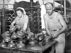 Israel, Work in the press for rubber products (sewage pump). On the right: Tzvi Neshri and Zilpa Ezer.

With cooperation of Nadav Mann / Bitmuna, 1950, Dany Benshalom, Rafi Benshalom, [object Object], [object Object], [object Object], [object Object], Dokuforte #3440