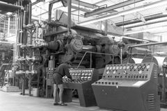 Israel, The "Calender B-18" system for PVC sheet production at the HaOgen factory,
Gershon Lichtendorf, 38, the electrician.

With cooperation of Nadav Mann / Bitmuna, 1964, Dany Benshalom, Rafi Benshalom, [object Object], [object Object], [object Object], [object Object], Dokuforte #3425