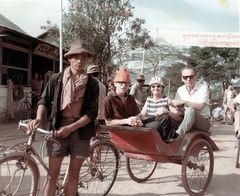 Cambodia, A day off for the family in Phnom Penh, the capital. Rafi, Tamar, and their youngest son Alex (Leksi) in a rickshaw.

With cooperation of Nadav Mann / Bitmuna, 1967, Dany Benshalom, Rafi Benshalom, [object Object], [object Object], [object Object], [object Object], Dokuforte #3646