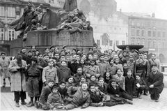 Czechoslovak Republic, A group of teenage immigrants on their way to Israel, near the Jan Hus monument in Prague, after World War II.

With cooperation of Nadav Mann / Bitmuna, 1945, Dany Benshalom, Rafi Benshalom, [object Object], [object Object], [object Object], [object Object], Dokuforte #3604