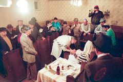 Hungary,Ukraine,Czechoslovak Republic, This changed drastically with the introduction of discriminatory laws, ghettoization, and physical extermination. After World War II, the remaining and diminished Jewish population of Subcarpathia faced even greater hardship due to the intensifying antisemitism after 1967.
From 1974, mass emigration began to Israel, the United States, Canada, and other Western countries. By 1990, only a tiny Jewish community remained in Munkács., 1993, Ferenc Kiss, Ferenc Kiss, [object Object], [object Object], [object Object], [object Object], [object Object], Dokuforte #5019